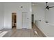 Light and open living space with a hallway and bathroom at 882 Cedar Canyon Se Sq, Marietta, GA 30067