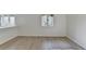 Bright open living room with wood-look flooring and large windows with lots of light at 882 Cedar Canyon Se Sq, Marietta, GA 30067
