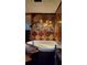 An eclectic bathroom featuring a jacuzzi tub and brown and gray tile at 1026 Riverbend Club Se Dr, Atlanta, GA 30339