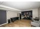 Finished basement featuring a large recreation area with wet bar at 1409 Echo Mill Dr, Powder Springs, GA 30127