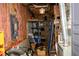 Unfinished basement area shows electrical panel, utility equipment, ductwork, and storage shelves at 1409 Echo Mill Dr, Powder Springs, GA 30127