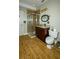 Bathroom featuring wood-look tile flooring, glass shower, granite vanity, and toilet at 1409 Echo Mill Dr, Powder Springs, GA 30127