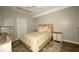 Cozy bedroom featuring a patterned rug, and warm paint at 1409 Echo Mill Dr, Powder Springs, GA 30127