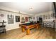 A game room is equipped with a full size pool table at 1409 Echo Mill Dr, Powder Springs, GA 30127