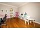 Spacious playroom with hardwood floors and plenty of room for play and storage at 1409 Echo Mill Dr, Powder Springs, GA 30127