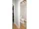 The toilet room features warm paint and natural light at 1409 Echo Mill Dr, Powder Springs, GA 30127