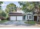 Charming townhome with a two-car garage and a well-manicured lawn at 2594 Laurel Nw Cir, Atlanta, GA 30311
