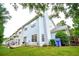 Townhouse exterior with a well-manicured lawn and a private patio for outdoor entertaining at 2594 Laurel Nw Cir, Atlanta, GA 30311