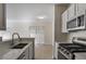 Updated kitchen featuring stainless steel appliances and plenty of counter space at 2594 Laurel Nw Cir, Atlanta, GA 30311
