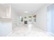Bright living room features large windows, fireplace, and light neutral paint colors at 2594 Laurel Nw Cir, Atlanta, GA 30311