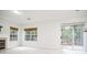 The living room has natural lighting, a fireplace, and sliding door access to the patio at 2594 Laurel Nw Cir, Atlanta, GA 30311