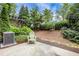 Landscaped backyard with a patio, a chair, and privacy landscaping at 3005 Devoncroft Se St, Smyrna, GA 30080