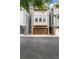 Charming townhome featuring stone accents and a two-car garage with inviting curb appeal at 3005 Devoncroft Se St, Smyrna, GA 30080