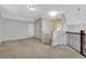 Comfortable upstairs loft space with carpet, neutral walls, and modern lighting at 3005 Devoncroft Se St, Smyrna, GA 30080
