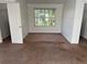 Bedroom with a large window and closet space at 4232 Marjorie Rd, Snellville, GA 30039