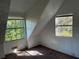 Bedroom featuring 2 windows with natural lighting and carpet at 4232 Marjorie Rd, Snellville, GA 30039