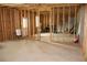 Unfinished basement space with exposed wood framing, ready to be personalized at 150 Canal St, Hampton, GA 30228