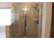 Tile shower with glass doors at 150 Canal St, Hampton, GA 30228