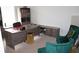 Office area features gray desk, bookcase, and green upholstered chairs at 150 Canal St, Hampton, GA 30228