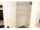 Walk-in pantry with ample shelving for organized storage at 150 Canal St, Hampton, GA 30228