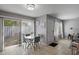 Cozy dining area featuring a glass table and access to the patio at 1500 Pine Log #D Ne Rd, Conyers, GA 30012