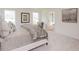Spacious bedroom with a view and natural light; soft carpet, and calm, neutral colors at 1577 Aiden Way # 39, Conyers, GA 30013