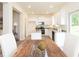 Bright modern kitchen features granite countertops, stainless steel appliances and island at 1577 Aiden Way # 39, Conyers, GA 30013