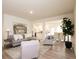 Bright living room features stylish furniture, modern decor, and an open layout at 1577 Aiden Way # 39, Conyers, GA 30013