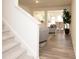 Bright open-plan featuring a staircase and view into living/dining area and kitchen at 1577 Aiden Way # 39, Conyers, GA 30013