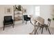 Stylish office space with a unique desk, comfortable chairs, and decorative shelving at 1577 Aiden Way # 39, Conyers, GA 30013