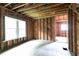 Unfinished living room featuring exposed wooden beams and framing, ready for customization at 1699 Emerald Sw Ave, Atlanta, GA 30310