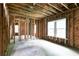 Unfinished living room featuring exposed wooden beams and framing, ready for customization at 1699 Emerald Sw Ave, Atlanta, GA 30310
