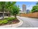 Exterior of townhomes showcasing the property's proximity to the city skyline at 384 16Th Nw St # 1, Atlanta, GA 30363