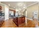 Open kitchen featuring stainless steel appliances, dark granite countertops and hardwood floors at 384 16Th Nw St # 1, Atlanta, GA 30363
