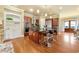 Well-appointed kitchen featuring a center island with seating, stainless steel appliances, and hardwood floors at 384 16Th Nw St # 1, Atlanta, GA 30363