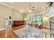 Bright living room with a stone fireplace, custom built-ins, and a comfortable seating area at 384 16Th Nw St # 1, Atlanta, GA 30363