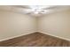 Basement bedroom featuring modern hardwood flooring and a ceiling fan at 7928 S Giles Rd, Douglasville, GA 30135