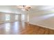 Spacious living room with hardwood floors and natural light from windows at 7928 S Giles Rd, Douglasville, GA 30135