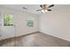 Spacious breakfast area featuring a ceiling fan, wood-look flooring, a door to the outside and a window at 135 E Hill St # 22, Decatur, GA 30030