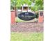 Attractive neighborhood sign with black iron fencing and brick pillars at 135 E Hill St # 22, Decatur, GA 30030