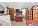 Spacious bedroom with neutral walls, multiple closets, and open access to adjoining rooms at 403 Rustic Ridge Cir, Lawrenceville, GA 30043