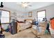 Bedroom features neutral walls, carpet, a ceiling fan, and two windows at 403 Rustic Ridge Cir, Lawrenceville, GA 30043