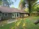 Well-maintained backyard featuring a patio area and lush greenery at 4298 Hillview Dr, Acworth, GA 30101