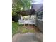 Backyard featuring a covered deck, shed, and fenced-in yard at 4298 Hillview Dr, Acworth, GA 30101