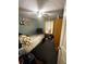 Bedroom featuring a ceiling fan, light-colored walls, and closet at 4298 Hillview Dr, Acworth, GA 30101