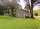 Rear view of home featuring a spacious yard; the perfect canvas for outdoor living and entertaining at 4298 Hillview Dr, Acworth, GA 30101