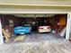 Attached garage with ample parking and storage space; includes cars, tools, and other belongings at 4298 Hillview Dr, Acworth, GA 30101