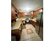 A cozy kitchen with stainless steel appliances and warm wood cabinetry at 4298 Hillview Dr, Acworth, GA 30101