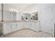 Bright bathroom featuring double sink granite vanity and spacious layout at 515 Old Chartwell Xing, Alpharetta, GA 30022