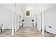 Grand foyer featuring a soaring ceiling, staircase, and hardwood floors at 515 Old Chartwell Xing, Alpharetta, GA 30022